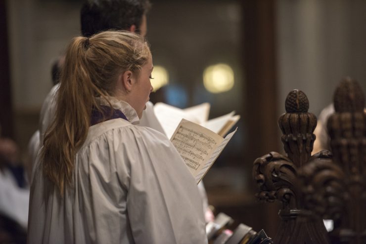 Choristers singing in the Great Choir during Evensong