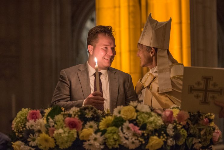 Bishop and worshipper at Easter Vigil in the Cathedral